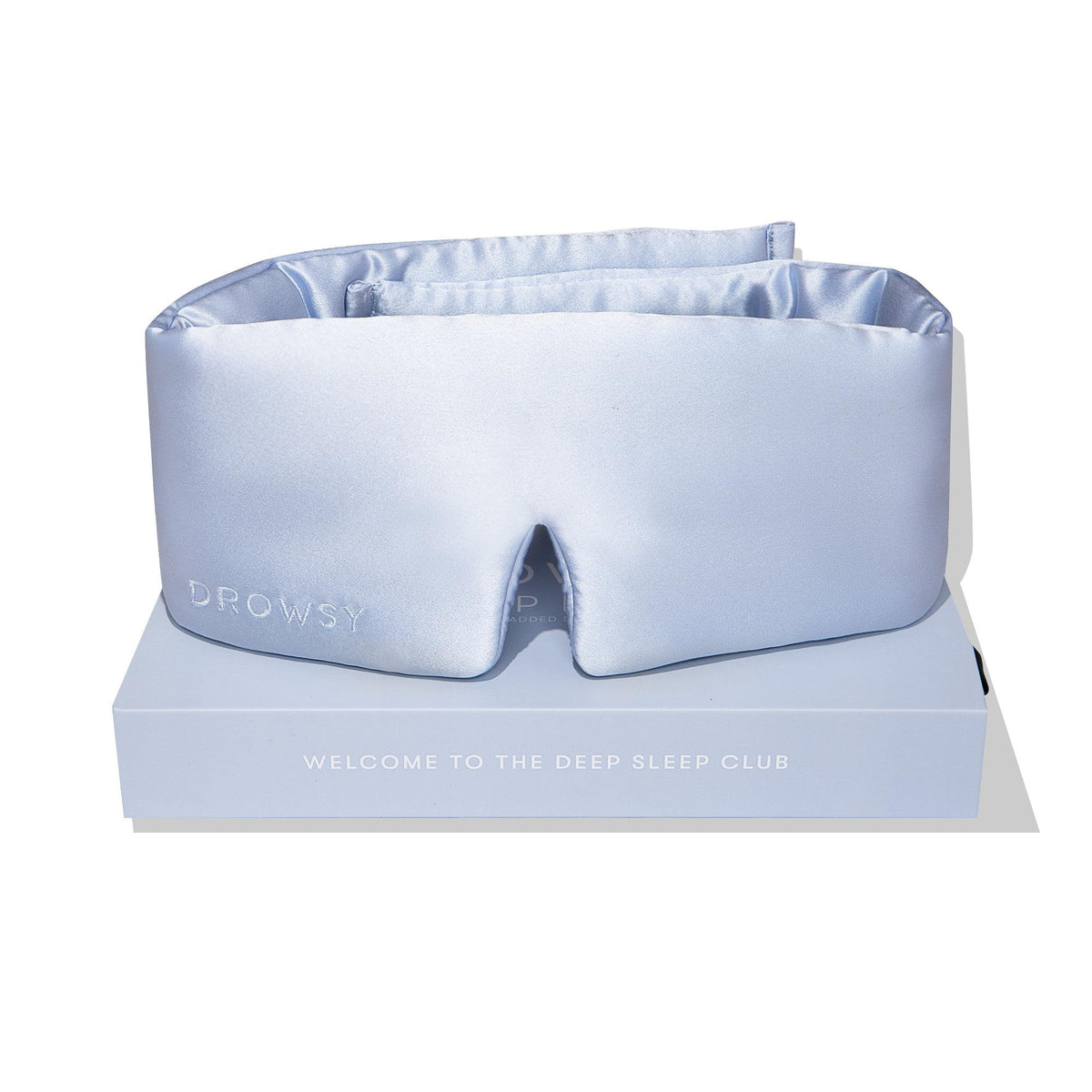 Drowsy mascarilla de seda azul Belle en empaque regalo para lujo nocturno.