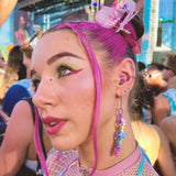 Estuche metálico impermeable de Eargasm en rosa para guardarlos.