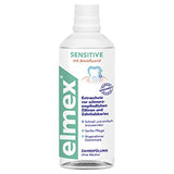 Elmex Sensitive, vertido en un vaso para enjuagues concentrados