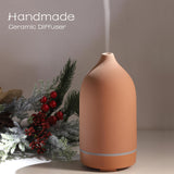 ENILYM difusor cerámico rojo, diseño minimalista para estancias elegantes.