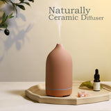 ENILYM difusor cerámico rojo, iluminación en 9 colores para ambientar.