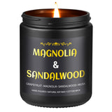 Vela Enwhisco Sandalwood en jarrón negro para escritorio elegante.