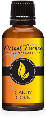 Candy Corn de Eternal Essence Oils en botella ámbar para velas perfumadas.