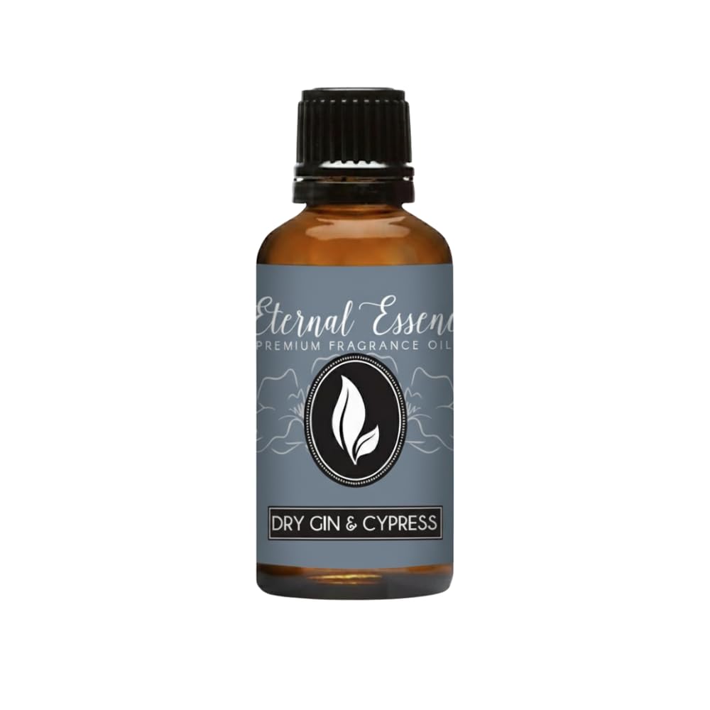 Eternal Essence Oils gin-seco y ciprés en botella ámbar para ambientación fresca.