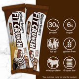 Fit Crunch barra proteica, sabor leche y galletas, aporte proteico para la jornada.
