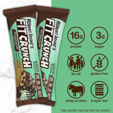 Escena de gimnasio con FITCRUNCH, snack práctico post-entrenamiento.