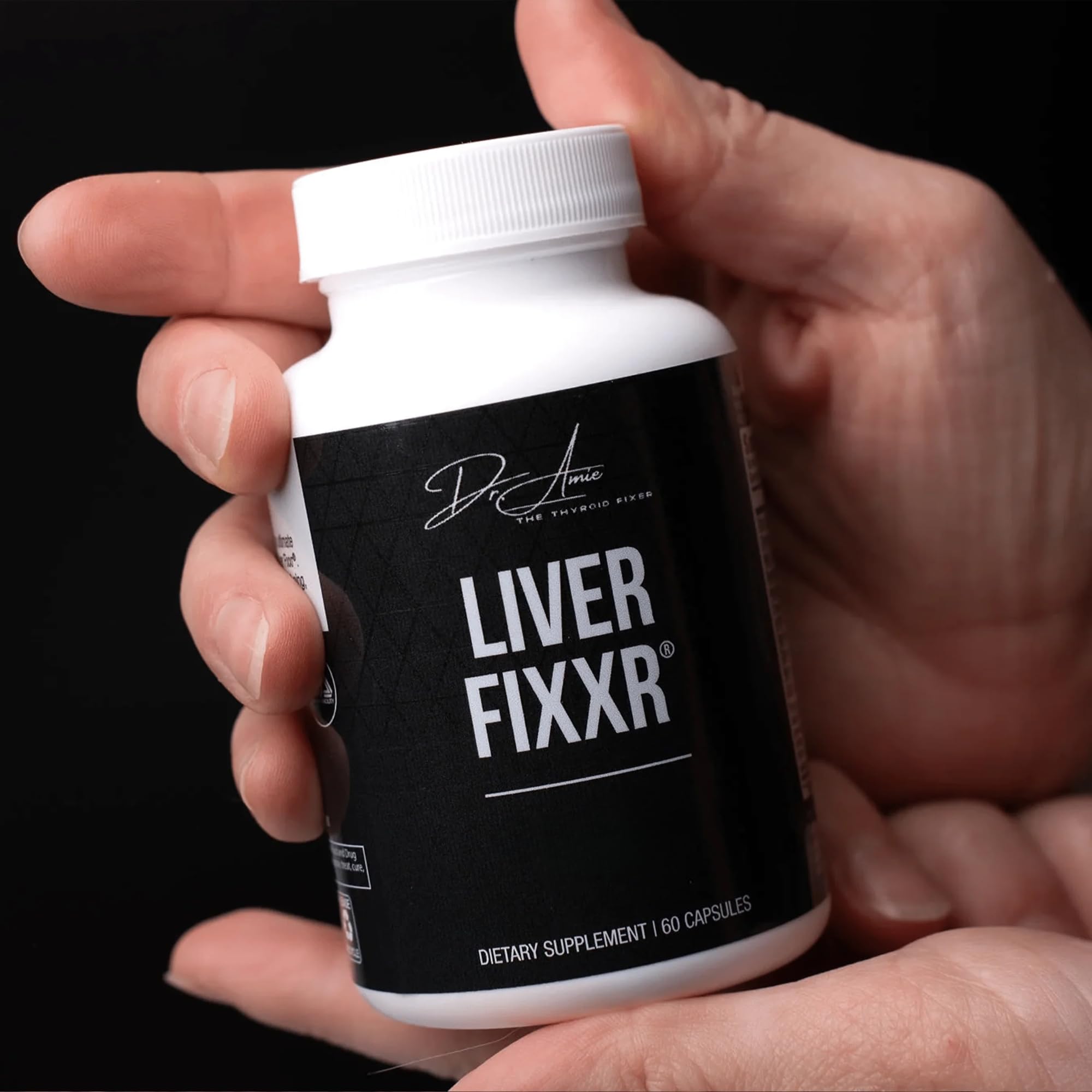 Fixxr Liver: etiqueta cercana mostrando la fórmula y la marca.