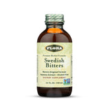 Flora amargos suecos en frasco ámbar, ideal para estimular la digestión.