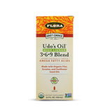 Flora Udo’s Omega 3-6-9 en envase cristal, ideal para añadir a comidas diarias.