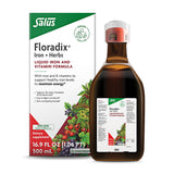 Floradix Hierro y Hierbas, botella vertiendo el líquido para uso diario.