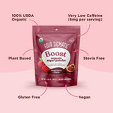 Cucharada de polvo con frambuesa roja para smoothie nutritivo Four Sigmatic.