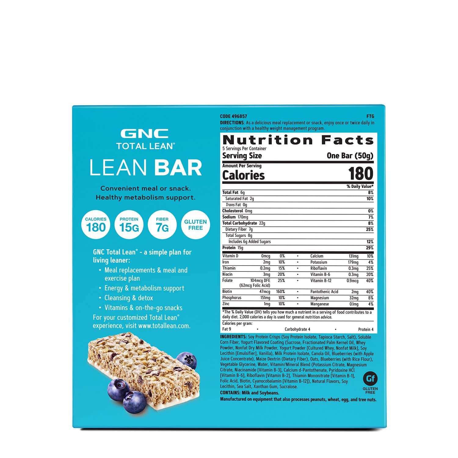 GNC Total Lean Bar en mano, snack proteico para tentempié sobre la marcha.