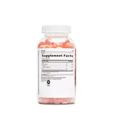 GNC Vitamina C Gomitas en la mano, aporte diario de 282 mg de vitamina C.
