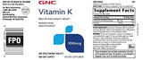 GNC Vitamina K 100mcg, etiqueta legible para dosis diaria.