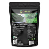 Go Nutra polvo de clorella con células rotas en envase, ideal para batidos.