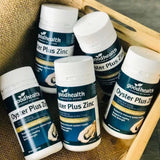 Goodhealth Oyster Plus, cápsulas detalle, muestra textura y forma del suplemento