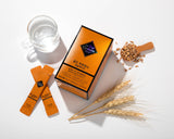 Stick disuelto en agua de GRAINON Gold Farro para una bebida suave.