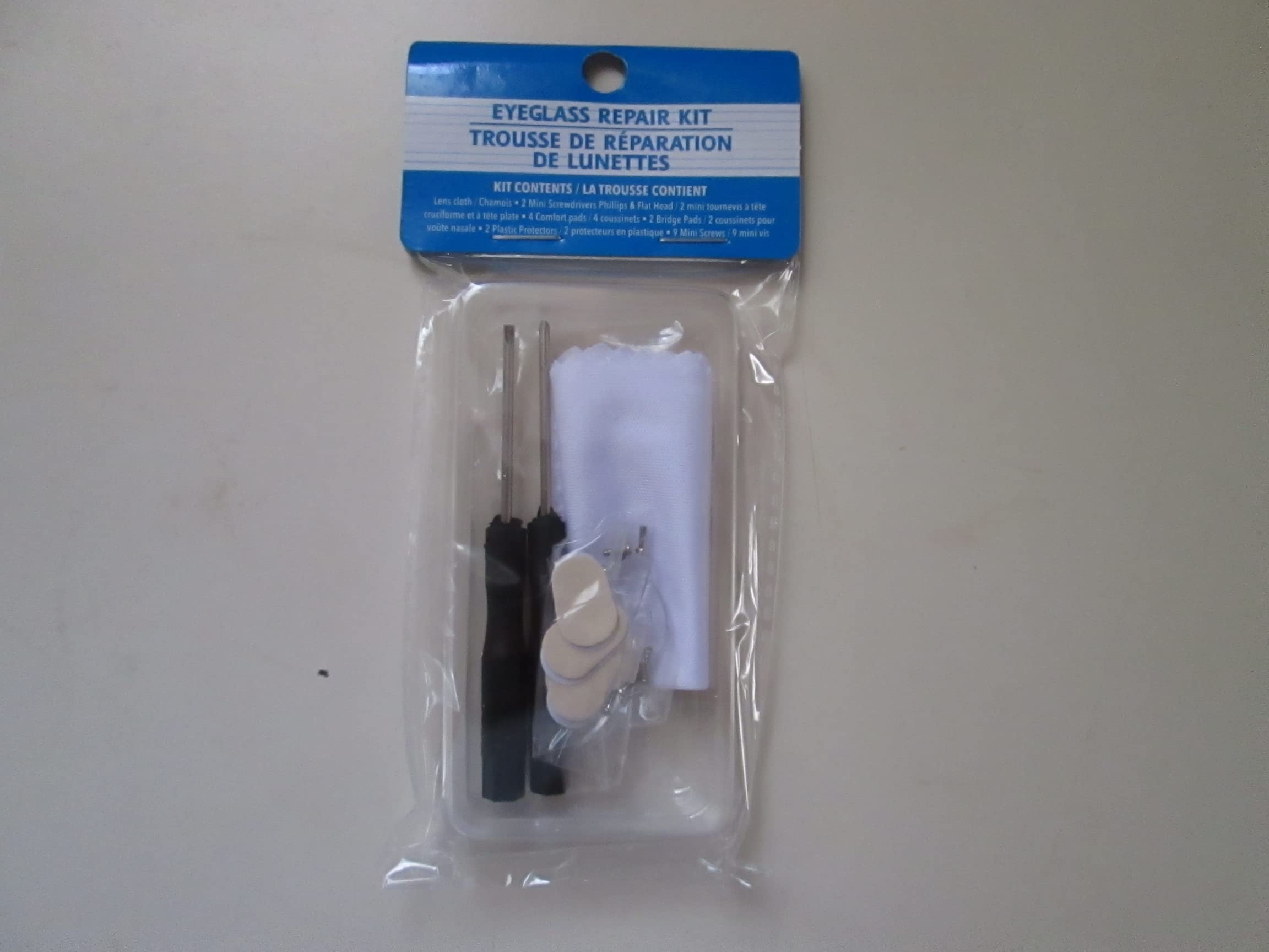Kit de reparación Greenbrier con lupa y mango extensor para gafas.
