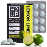 Tableta H2UP disolviéndose en agua para hidratación limpia y sin sabor.