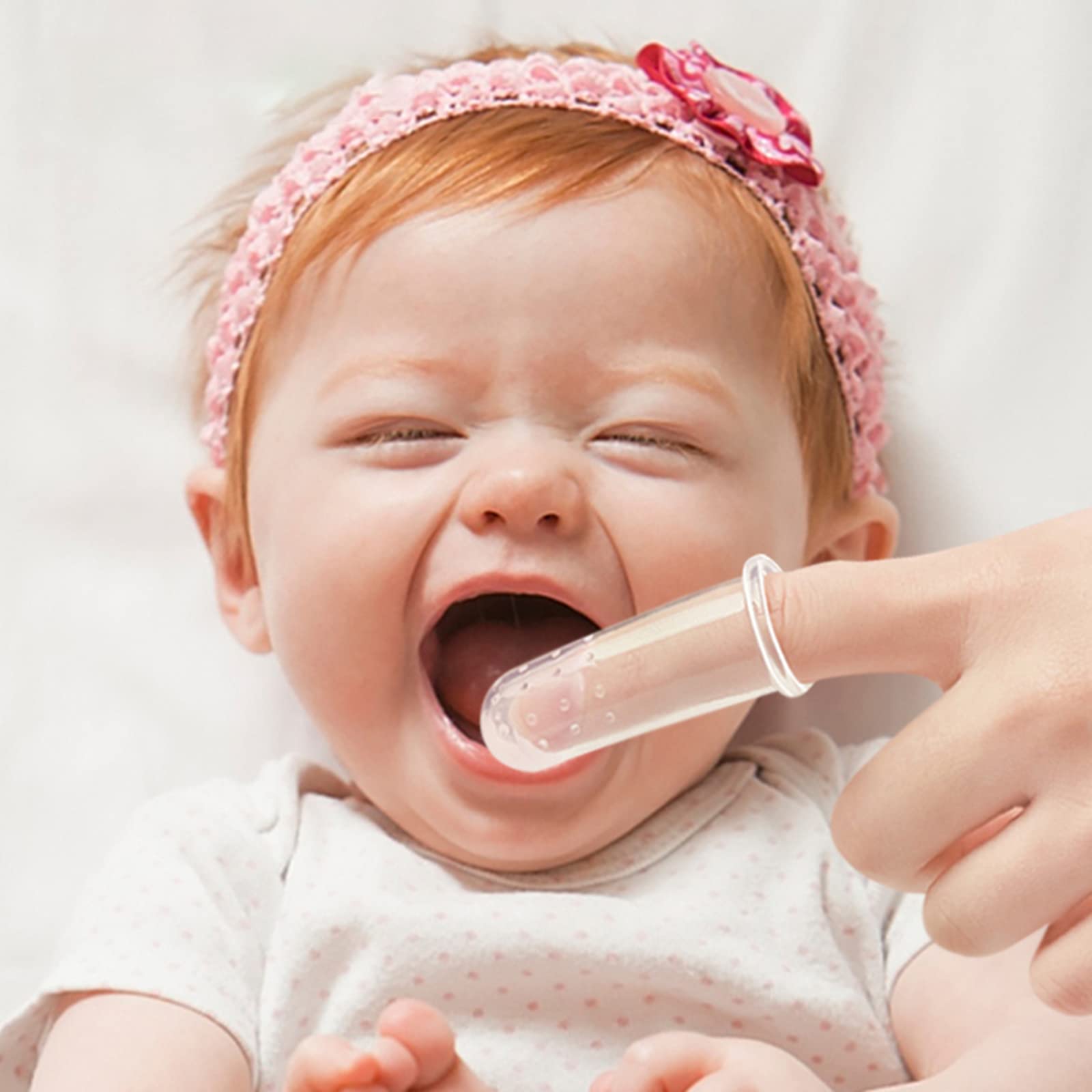 Haakaa dedo cepillo dientes con diseño seguro, protege tu dedo mientras cuidas al bebé.