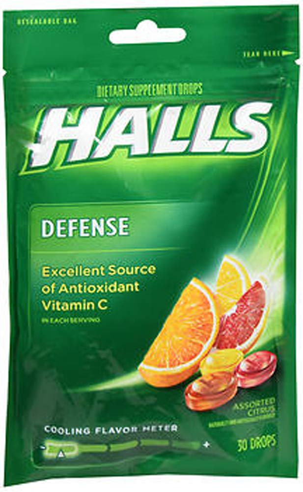 Halls Defense Drops envase cítrico con vitamina C y sabor variado.