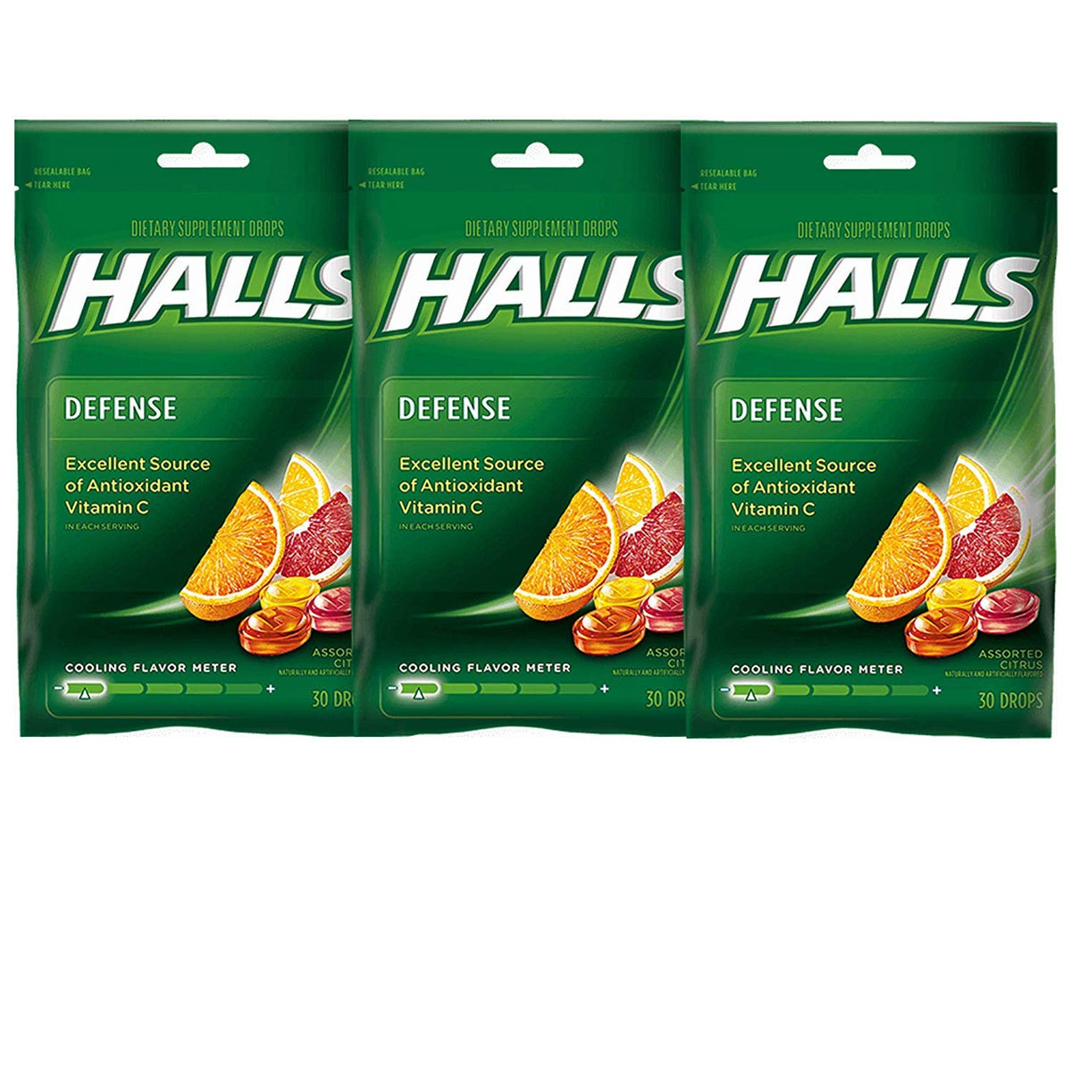Halls Defense Drops Vitamina C, botella de cítricos para apoyar el bienestar diario.