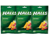 Halls Defense Drops Vitamina C, botella de cítricos para apoyar el bienestar diario.