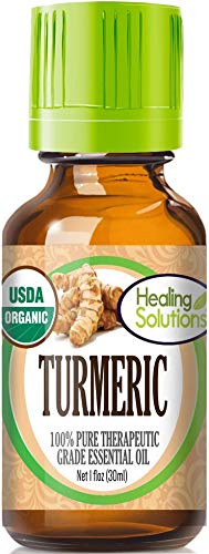 Healing Solutions aceite esencial cúrcuma en botella para cuidado de piel y cabello.