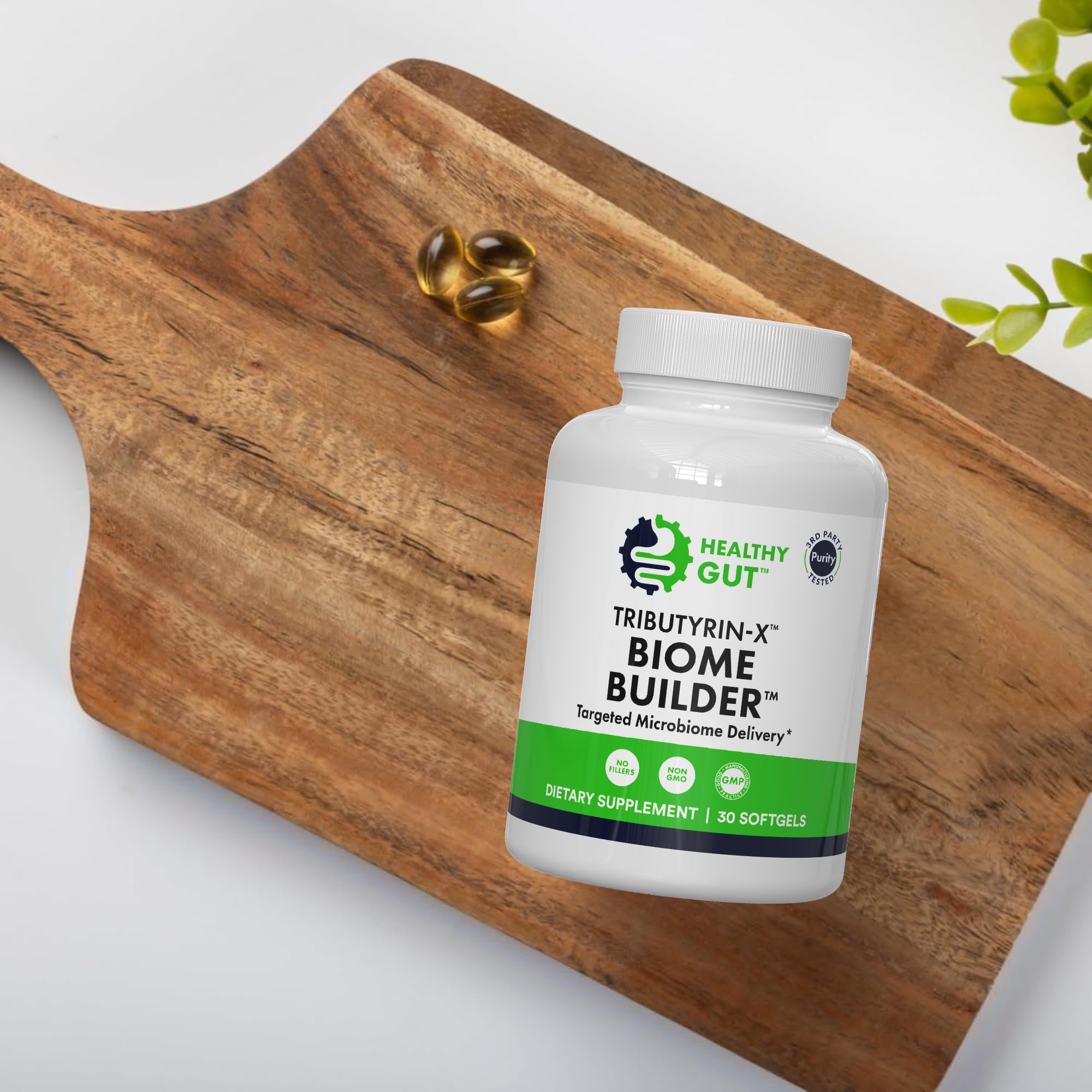 Healthy Gut Tributyrin-X: primer plano de la botella para recordar dosis diaria.