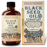 Herbal Organic Works botella de vidrio con aceite negro etíope para piel suave.