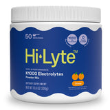 Hi-Lyte K1000, polvo de electrolitos naranja, ayuda a la hidratación durante entrenamientos.