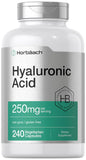 Horbäach ácido hialurónico, bote de cápsulas, apoyo para la hidratación diaria de la piel.