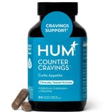 Hum Counter Cravings: botella derramando cápsulas para apoyar hábitos diarios.