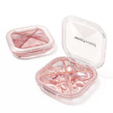 HyJeryty caja de pastillas con 4 compartimentos en rosa para organización diaria.