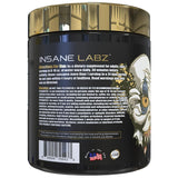 Cucharilla de medición y polvo de Psychotic Gold, uso práctico para potencia en el gym.