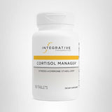 Integrative Therapeutics Cortisol Manager on nightstand promoting calm before sleep.