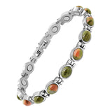 Pulsera magnética JEROOT con turquesa en detalle, resistente y hipoalergénica para uso diario.