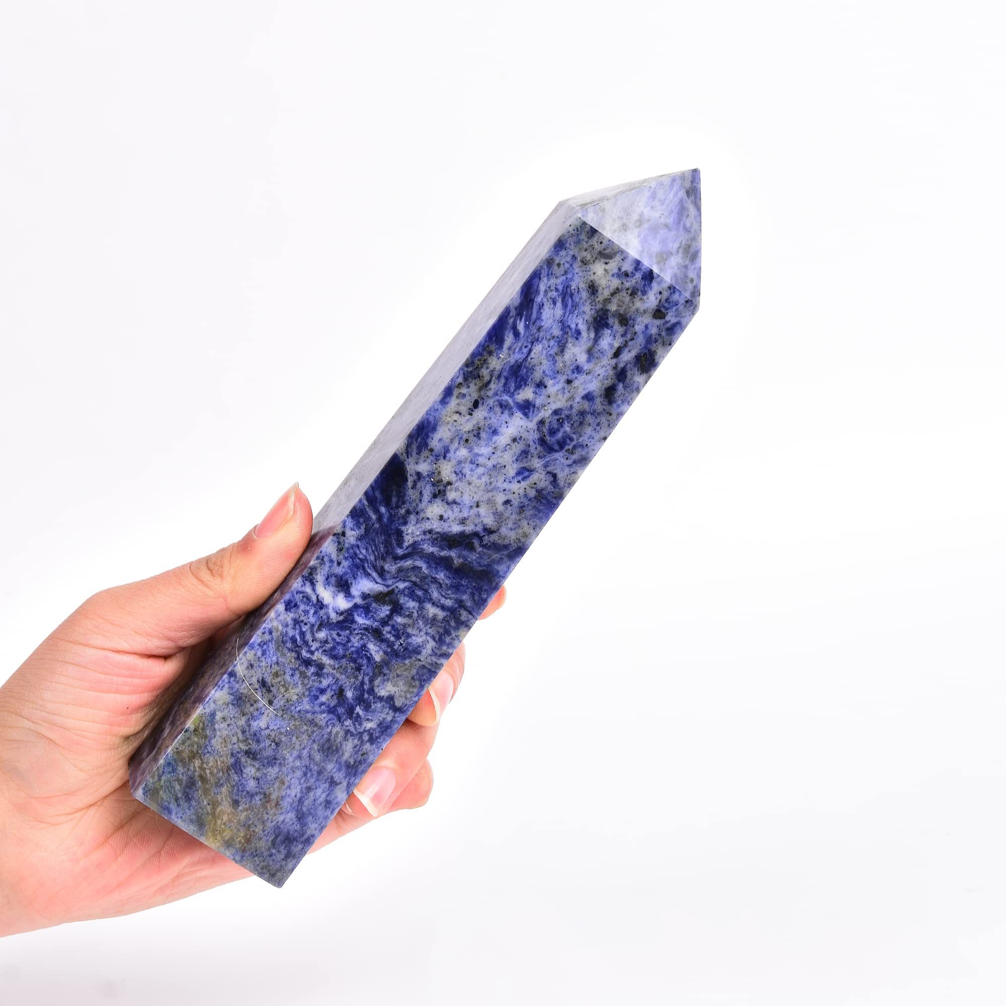 Piedra sodalita azul de JIC Gem, resalta claridad mental durante la práctica.
