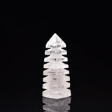 JIC Gem torre cristal cuarzo claro, vista frontal, foco sereno para el escritorio.