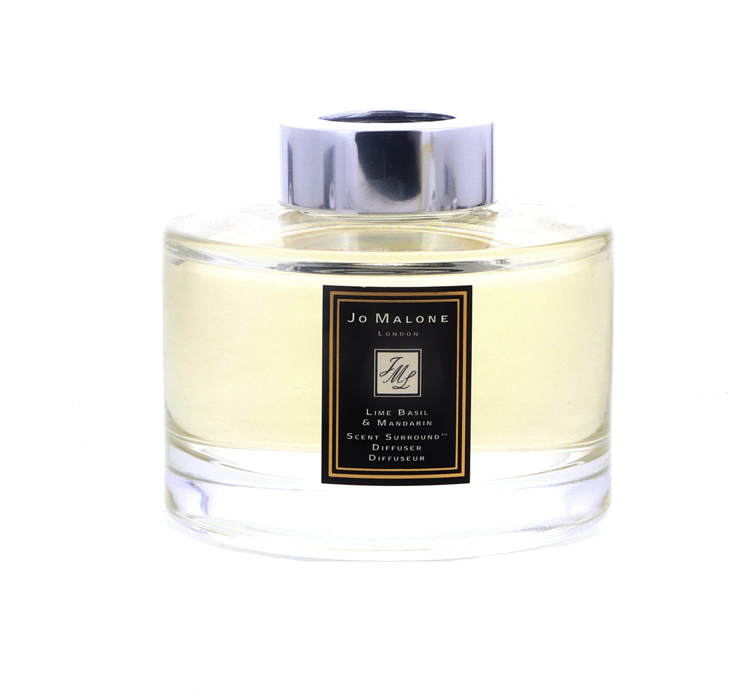 Difusor Jo Malone con fragancia cítrica y frutal para salones elegantes.