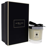 Vela Jo Malone Lima, albahaca y mandarina, tapa abierta revela notas cítricas y herbales