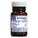 Mano sosteniendo cápsulas de Kyo-Dophilus Fifty Plus para rutina saludable.