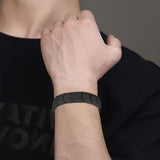 Pulsera magnética KYOSI de titanio en negro, look clásico para ocasiones