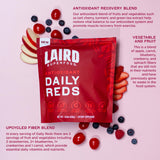 Frutas y verduras visibles en Daily Reds de Laird para batido nutritivo.