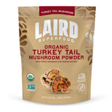 Polvo hongo cola de pavo de Laird Superfood en bolsa, ideal para vitalidad diaria.