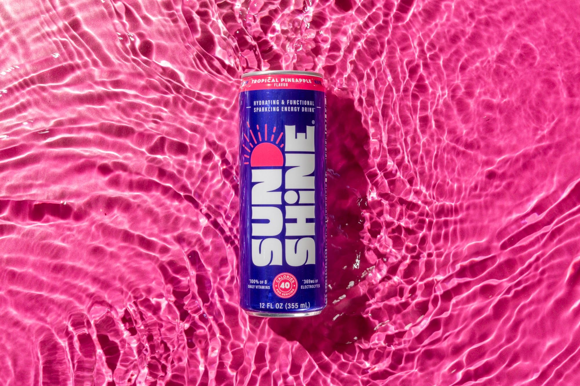 Legendary Sunshine envase con piña tropical para un impulso refrescante.