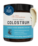 Live Conscious Colostrum en polvo en bote frontal; apoyo al sistema inmunitario.
