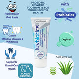Primer plano de la pasta dental Luv Biotics, textura cremosa lista para cepillado.