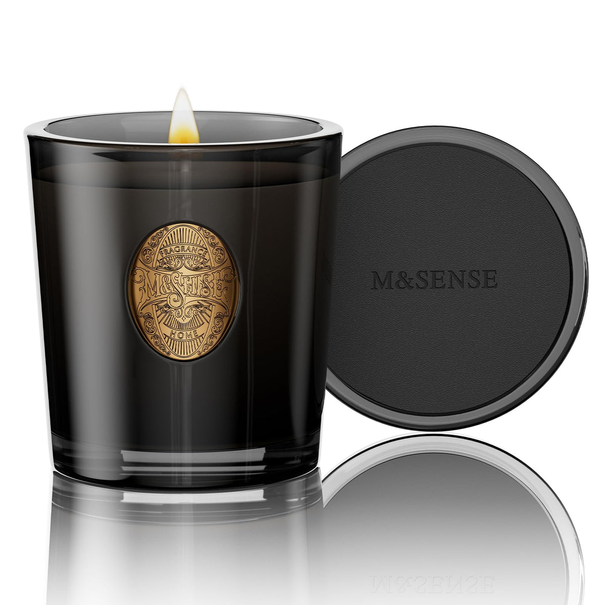 Vela M&SENSE de soya en vaso negro para crear un ambiente relajante.