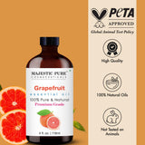 Aceite de pomelo Majestic Pure en botella ámbar para proteger la calidad.
